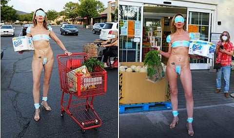 ലോക്ക്ഡൗൺ വേണ്ട; മാസ്ക് ബിക്കിനിയാക്കി യുവതിയുടെ പ്രതിഷേധം; ചിത്രങ്ങൾ വൈറൽ