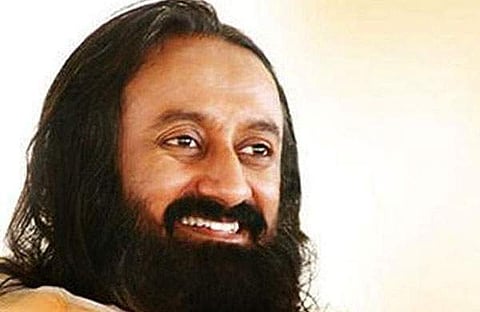 കോവിഡ് മനുഷ്യനിര്‍മ്മിത ദുരന്തം, പ്രതിരോധത്തിന് യോഗയും പ്രാണായാമവും: ശ്രീ ശ്രീ രവിശങ്കര്‍