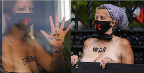 'നഗ്ന സത്യത്തെ മറച്ചുവെക്കാനാകുമോ ?'; മാറിടം മറയ്ക്കാതെ സ്ത്രീകളുടെ പ്രതിഷേധം  ( ചിത്രങ്ങള്‍)