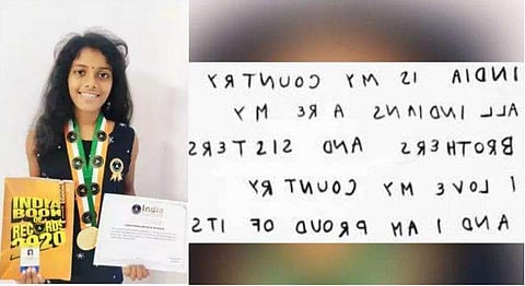 ഇന്ത്യൻ പ്രതിജ്ഞ ഒരു മിനിറ്റിൽ തിരിച്ചെഴുതി; ഇന്ത്യ ബുക്ക് ഓഫ് റെക്കോഡ്‌സിൽ ഇടം നേടി ദേവിനന്ദന