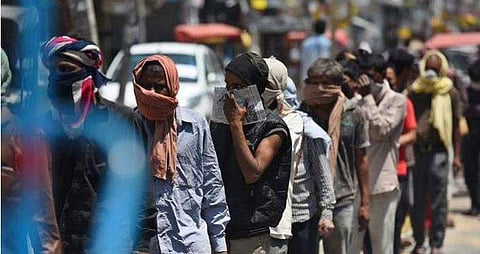 കോവിഡ് രോഗിയായ അതിഥി തൊഴിലാളിക്ക് വിശ്രമം അനുവദിക്കണം ; ജോലി ചെയ്യിക്കാമെന്ന വിവാദ ഉത്തരവ് സര്‍ക്കാര്‍ തിരുത്തി