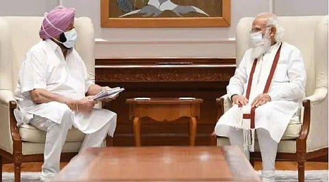 അമരീന്ദർ സിങ് മോദിയുമായി ചർച്ച നടത്തുന്നു / ഫയൽ ചിത്രം