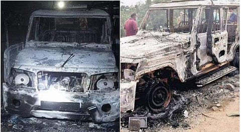 അക്രമികൾ അ​ഗ്നിക്കിരയാക്കിയ പൊലീസ് ജീപ്പ്