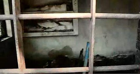 യുവതിയുടെ മൃതദേഹം കത്തിക്കരിഞ്ഞ നിലയിൽ/ ടെലിവിഷൻ ദൃശ്യം