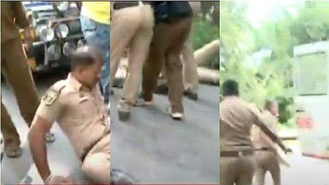 പൊലീസുകാർ റോഡിൽ തെറിച്ചുവീണപ്പോൾ/ ടെലിവിഷൻ ദൃശ്യം