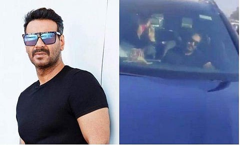 അജയ് ദേവ്​​ഗൺ/ ഫേയ്സ്ബുക്ക്, യുവാവ് താരത്തിന്റെ കാർ തടയുന്നതിന്റെ വിഡിയോ ദൃശ്യം