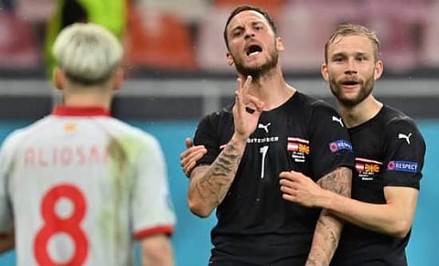 ഗോളാഘോഷത്തിന് ഇടയിൽ മാസിഡോണിയൻ താരത്തെ അധിക്ഷേപിച്ച് ഓസ്ട്രിയൻ താരം മാർക്കോ അർനമോട്ടോവിച്ച്