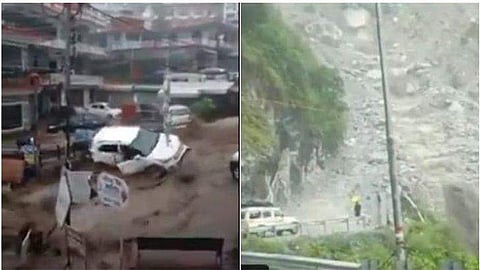മലവെള്ളപ്പാച്ചിലില്‍ വാഹനങ്ങള്‍ ഒഴുകിപ്പോകുന്നു / എഎന്‍ഐ