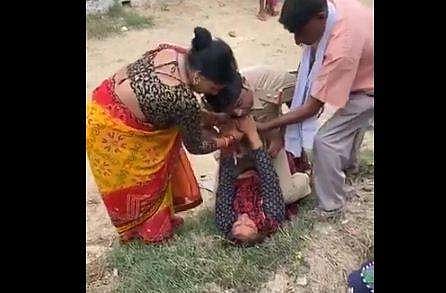 യുവതിയും പൊലീസുകാരനും തമ്മിലുള്ള മല്‍പ്പിടിത്തം