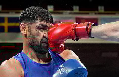 ഒളിംപിക്‌സ് ക്വാര്‍ട്ടര്‍ ഫൈനലില്‍ സതീഷ് കുമാര്‍/ഫോട്ടോ: പിടിഐ