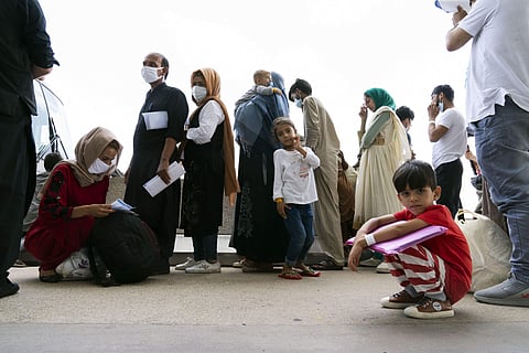 അഫ്ഗാനില്‍ നിന്ന് പലായനം ചെയ്യുന്നവര്‍/പിടിഐ