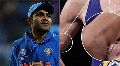 രവി ദഹിയയെ കസാകിസ്ഥാന്‍ താരം കടിക്കുന്നത് ചൂണ്ടി വീരേന്ദര്‍ സെവാഗ് ട്വിറ്ററില്‍ പങ്കുവെച്ച ചിത്രം