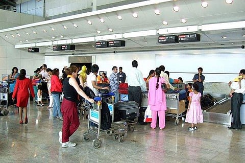 travellers waiting at airport