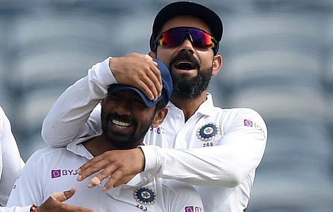 കോഹ്‌ലി, വൃധിമാന്‍ സാഹ/ഫോട്ടോ: എഎഫ്പി