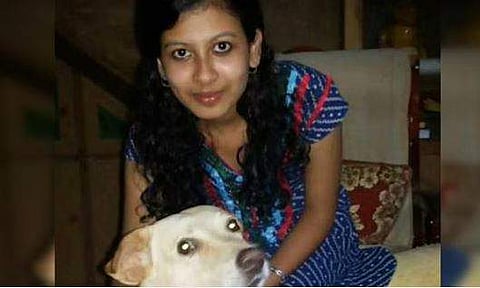 വളര്‍ത്തുനായ ടോമിക്കൊപ്പം ഗ്രീഷ്മ, ഫോട്ടോ: എക്‌സ്പ്രസ്