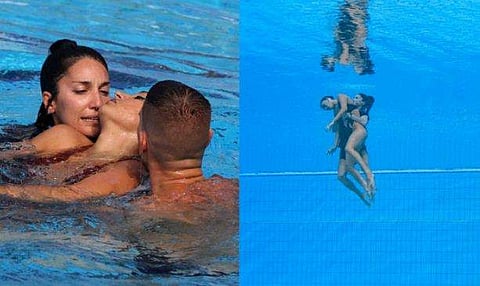 പൂളില്‍ ബോധരഹിതയായ അനിറ്റ അല്‍വാരസിനെ രക്ഷിക്കുന്നു/ഫോട്ടോ: എഎഫ്പി