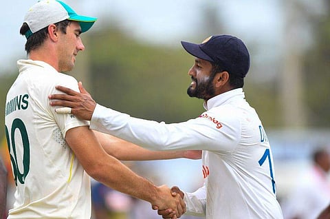 കമിന്‍സ്, കരുണരത്‌നെ/ഫോട്ടോ: എഎഫ്പി