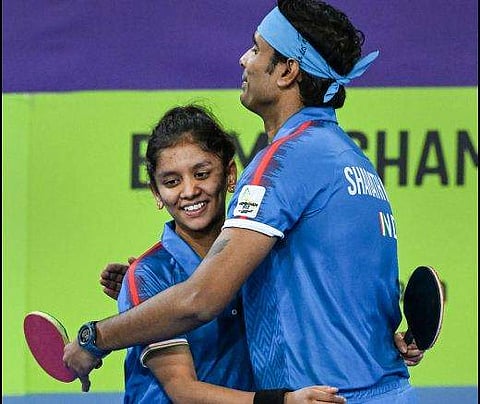 സ്വര്‍ണം നേടിയ ശ്രീജ-ശരത് കമാല്‍ ജോഡിയുടെ ആഹ്ലാദം/ പിടിഐ