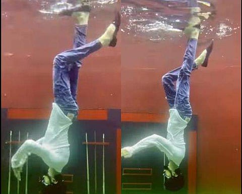 വെള്ളത്തിന്റെ അടിയില്‍ ഡാന്‍സ് ചെയ്യുന്ന കലാകാരന്റെ ദൃശ്യം