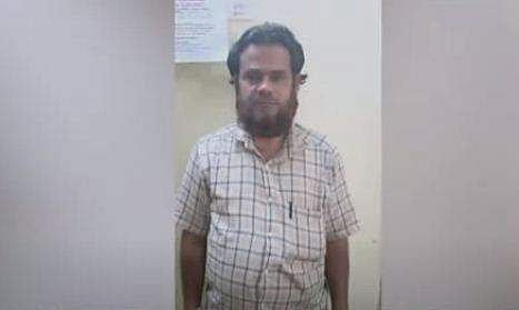 അറസ്റ്റിലായ അധ്യാപകന്‍ ഫൈസല്‍/ ടിവി ദൃശ്യം