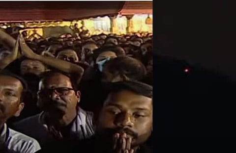 മകരജ്യോതി ദർശനം നടത്തുന്ന ഭക്തർ/ ടെലിവിഷൻ ദൃശ്യം