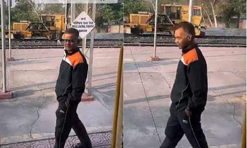 ട്രെയിനിനൊപ്പം നടക്കുന്ന അച്ഛൻ /ചിത്രം സ്ക്രീൻഷോട്ട്