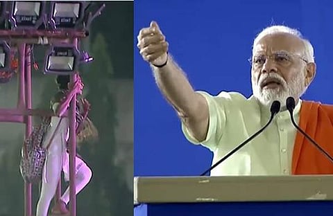 പോസ്റ്റിൽ വലിഞ്ഞു കയറി യുവതി, നരേന്ദ്ര മോദി/ എക്‌സ്