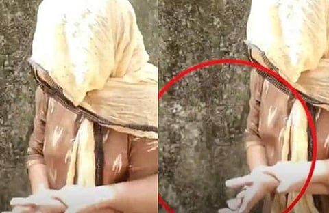 തെളിവെടുപ്പിനിടെ മാധ്യമപ്രവര്‍ത്തകന്‍ വീണപ്പോള്‍ അനിതകുമാരി കയ്യടിക്കുന്നു