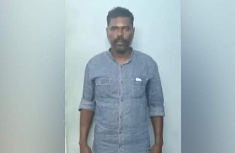 അറസ്റ്റിലായ ദിനേശൻ/ ചിത്രം ടെലിവിഷൻ സ്ക്രീൻഷോട്ട്