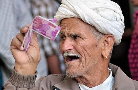 2000 രൂപ നോട്ട് ഇറങ്ങിയ സമയത്ത് ബാങ്കില്‍നിന്നു കിട്ടിയ ആളുടെ പ്രതികരണം/ഫയല്‍