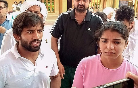 ബജ്റം​ഗ് പുനിയ, സാക്ഷി മാലിക്/ പിടിഐ