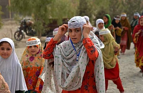 താലിബാന്‍ സര്‍ക്കാരിന്റെ രണ്ടാം വാര്‍ഷിക ആഘോഷത്തിന്റെ ഭാഗമായി നടന്ന റാലിയില്‍ പെണ്‍കുട്ടികള്‍/എഎഫ്പി