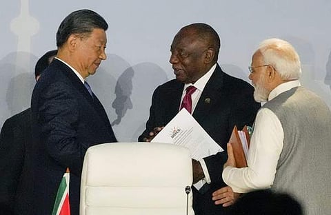 ബ്രിക്‌സ് ഉച്ചകോടി വേദിയില്‍ പ്രധാനമന്ത്രി നരേന്ദ്ര മോദിയും ചൈനീസ് പ്രസിഡന്റ് ഷി ജിന്‍പിങും/പിടിഐ