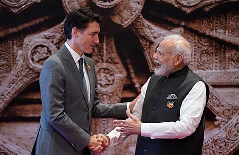 ജി20 ഉച്ചകോടിക്കെത്തിയ കനേഡിയൻ പ്രധാനമന്ത്രി ജസ്റ്റിൻ ട്രൂഡോയെ സ്വാ​ഗതം ചെയ്ത് മോദി/ചിത്രം: എപി