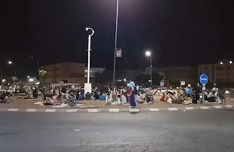 മൊറോക്കോയിലെ മാരക്കേഷില്‍ തുടര്‍ ചലനങ്ങള്‍ ഭയന്ന് തുറസ്സായ സ്ഥലങ്ങളില്‍ രാത്രി ചെലവഴിക്കുന്ന ജനങ്ങള്‍/എഎഫ്പി