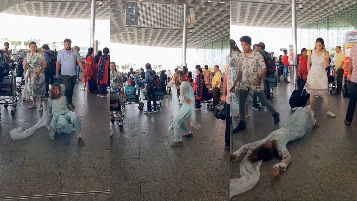 'ഒന്നു വൈറലാവാന്‍ നോക്കിതാ, പാവം എയറിലായി'; വിമാനത്താവളത്തില്‍ നിലത്തിഴഞ്ഞ് യുവതിയുടെ നൃത്തം, വിഡിയോ