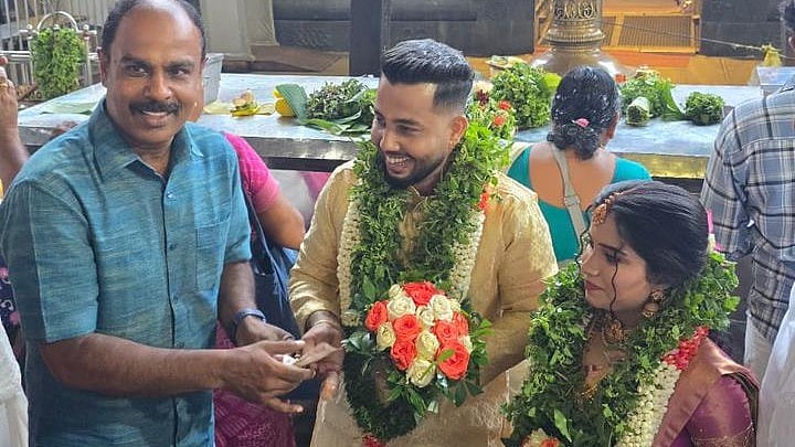 കാണിക്കയിടാന്‍ യുഎഇ ദിര്‍ഹം; ഗുരുവായൂരമ്പല നടയില്‍ സുജിത്തിനു വിവാഹം