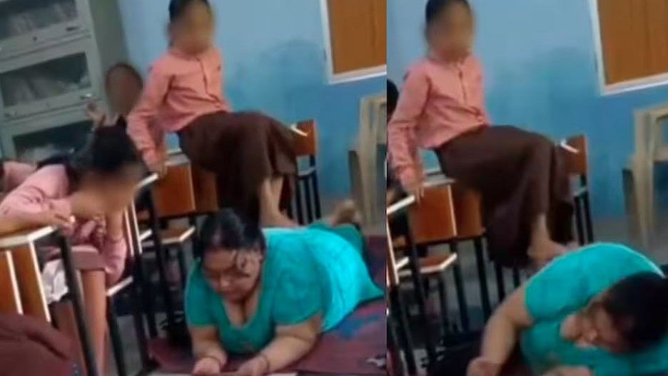 ക്ലാസ് മുറിയില്‍ കമിഴ്ന്നു കിടന്നു, പെണ്‍കുട്ടികളെ കൊണ്ട് മസാജ് ചെയ്യിപ്പിച്ച് അധ്യാപിക,  വിഡിയോ