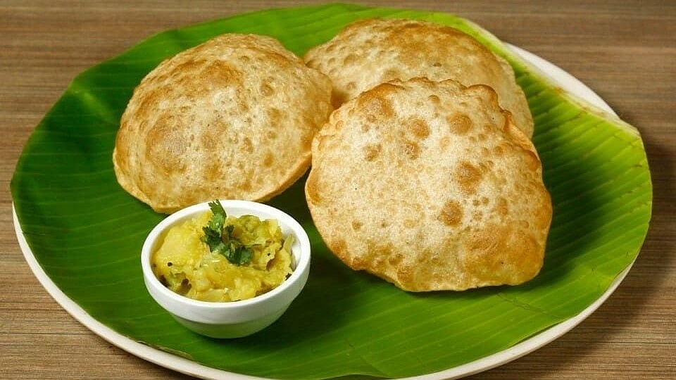 പൂരി ഇനി പപ്പടം പോലെയാകില്ല, സോഫ്റ്റാകാനും എണ്ണ കുറയ്ക്കാനും ചില ടിപ്സ്