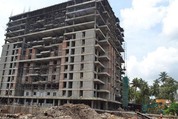 ഉമ്മന്‍ചാണ്ടിക്കും ഭരത് ഭൂഷണും ആശ്വാസം ; പാറ്റൂര്‍ ഭൂമിയിടപാട് കേസ് ഹൈക്കോടതി റദ്ദാക്കി
