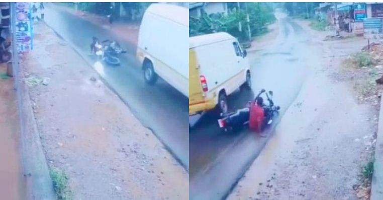 മഴയില്‍ കുതിര്‍ന്ന റോഡില്‍ മീറ്ററുകളോളം ബൈക്കുമായി തെന്നി നീങ്ങി യുവാവ് ; അത്ഭുതകരമായ രക്ഷപ്പെടല്‍ ; ട്വിസ്റ്റ് ( വീഡിയോ)
