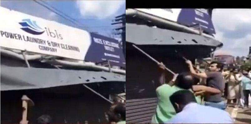 അങ്കമാലി അപകടം: കാഴ്ചമറച്ച കെട്ടിടം യൂത്ത് കോണ്‍ഗ്രസ് പ്രവര്‍ത്തകര്‍ തകര്‍ത്തു ;  പൊളിച്ചുനീക്കുമെന്ന് നഗരസഭാധ്യക്ഷ