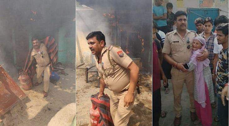 പുതപ്പ് മൂടി കത്തുന്ന വീടിനുള്ളില്‍ കയറി, ഗ്യാസ് സിലിണ്ടറുമായി പുറത്തേക്ക്; എസ് ഐയുടെ ധീരതയ്ക്ക് കയ്യടി