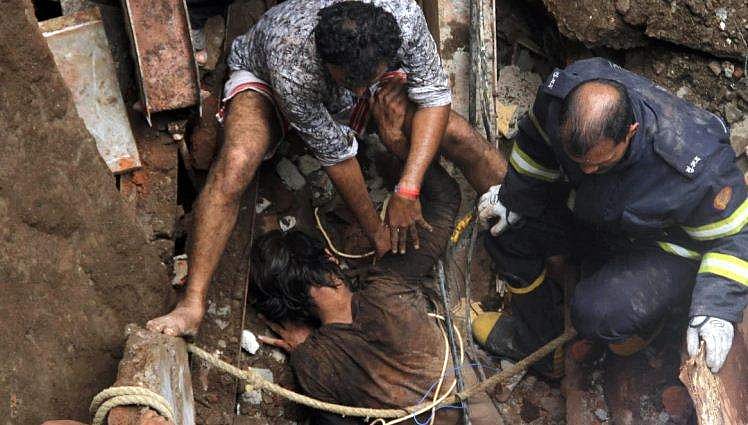 നാലുനില കെട്ടിടത്തിന് നൂറ്റാണ്ടു പഴക്കം; മുംബൈയില്‍ കെട്ടിടം തകര്‍ന്ന് മരിച്ചവരുടെ എണ്ണം 14 ആയി