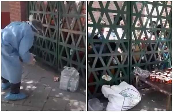 പൂട്ടിയിട്ട ഗേറ്റിനുള്ളില്‍ തിക്കി തിരക്കി ജനം; ഭക്ഷണവും വെള്ളവും എറിഞ്ഞുകൊടുക്കുന്നയാള്‍; ഇതും 'ഉത്തര്‍പ്രദേശ് മോഡല്‍' (വീഡിയോ)
