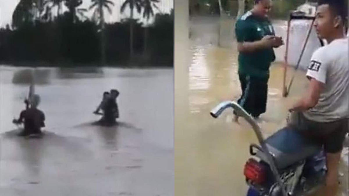 കഴുത്തോളം വെളളം, ഹാന്ഡിലും മറഞ്ഞ് ഒഴുക്ക്; വെളളപ്പൊക്കത്തിലൂടെ ബൈക്ക് ഓടിച്ച് യുവാക്കള്, അതിസാഹസികത (വീഡിയോ)