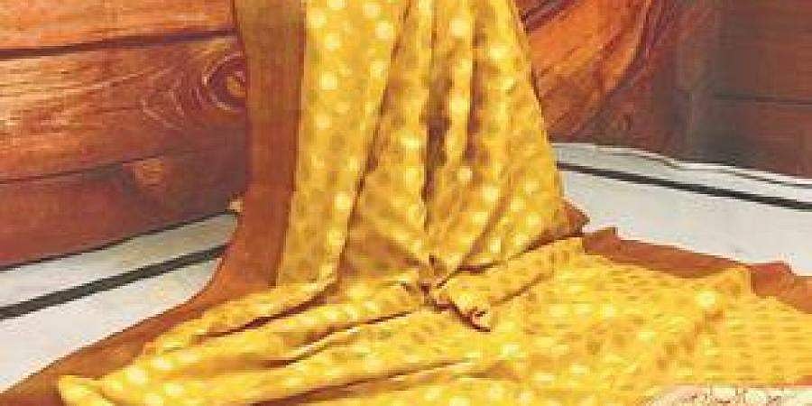 വിലകൂടിയ സാരി കത്തിപ്പോയെന്ന് തയ്യല്‍ക്കാരി; നഷ്ടപരിഹാരം നല്‍കാന്‍ രണ്ട് വര്‍ഷത്തിന് ശേഷം കോടതി ഉത്തരവ് 