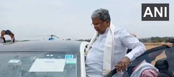 തുറന്നിട്ട കാറില്‍ ജനങ്ങളെ അഭിവാദ്യം ചെയ്തു; അടിതെറ്റി വീണ് സിദ്ധരാമയ്യ (വീഡിയോ)